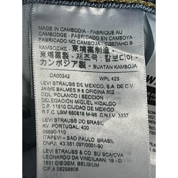 Levis 711 Skinny Jeans Womens 28 Blue Distressed Ripped Raw Hem Stretch Denim - Picture 10 of 15